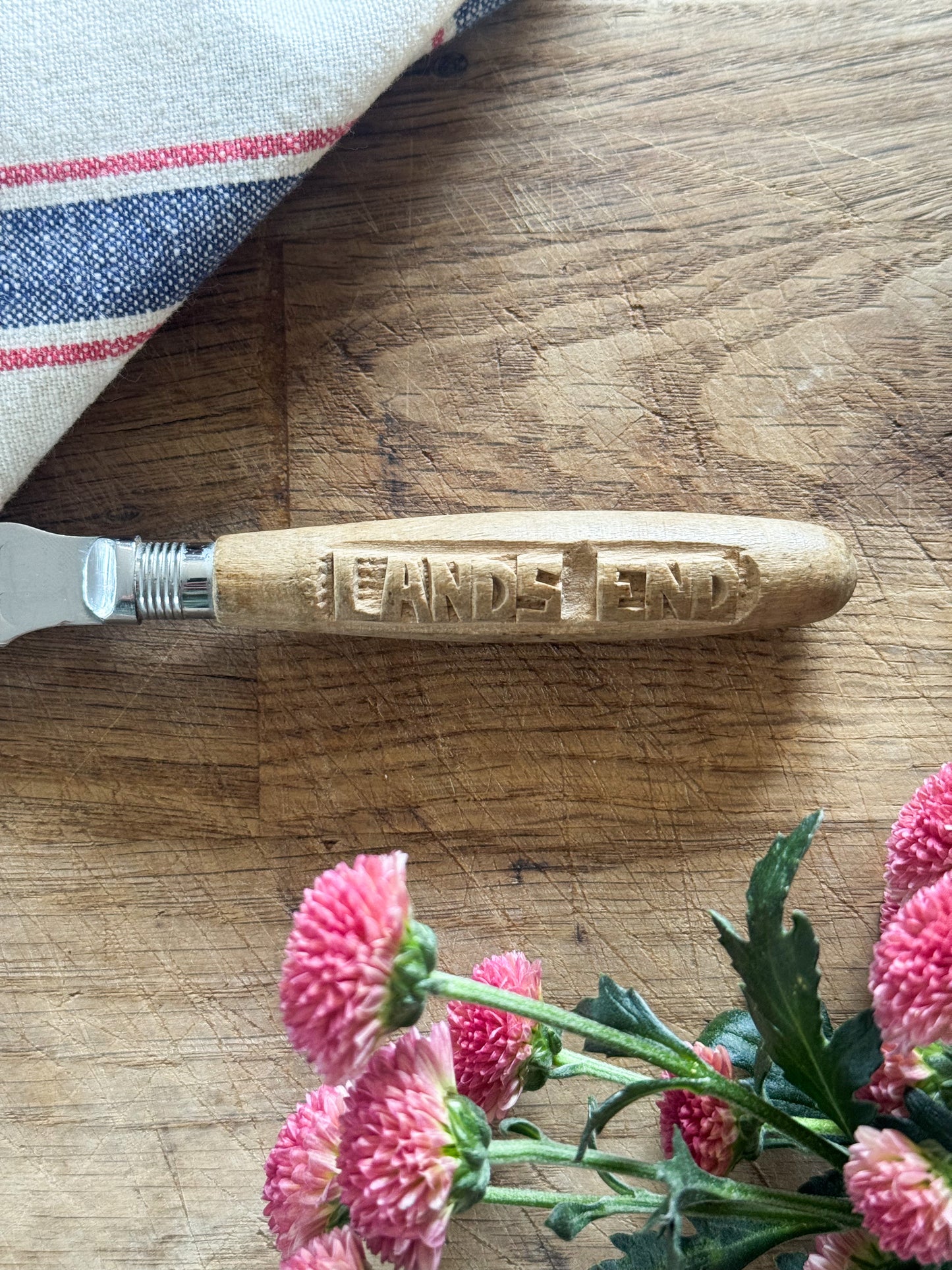 Vintage Chrome Plated Butter Knife with Hand-Carved Handle “Lands End”