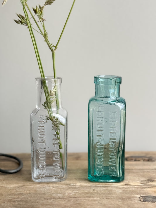 Pair of Antique Eiffel Tower Juices Glass Bottles