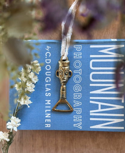 Vintage Solid Brass Folk Figure Bottle Opener with Silk Ribbon