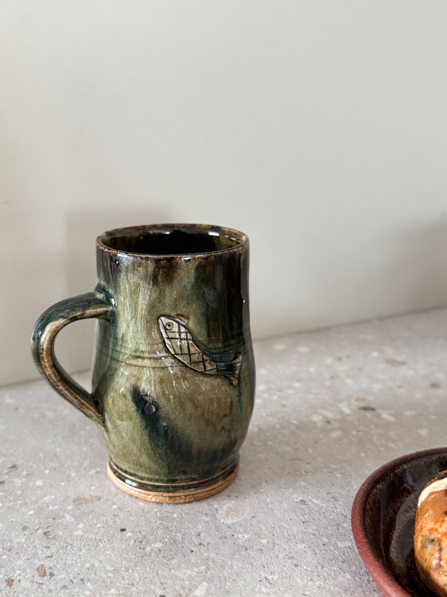 Handmade Studio Pottery Mug with Carved Fish Motif
