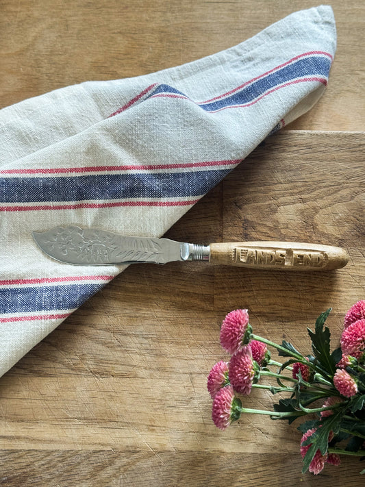 Vintage Chrome Plated Butter Knife with Hand-Carved Handle “Lands End”