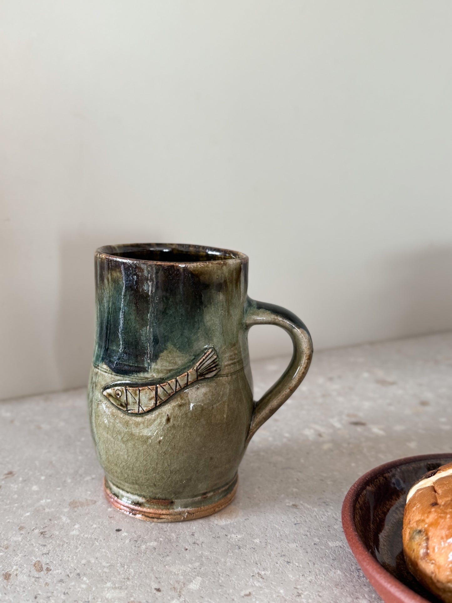 Handmade Studio Pottery Mug with Carved Fish Motif