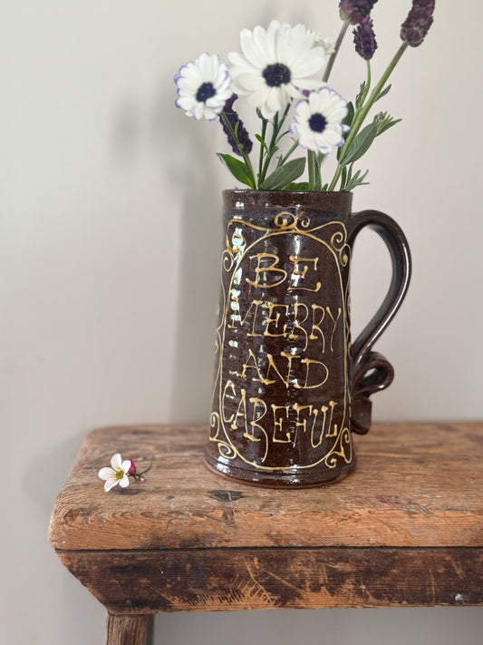 Rare Peter Currell Brown Slipware Motto Jug – “Be Merry and Careful”